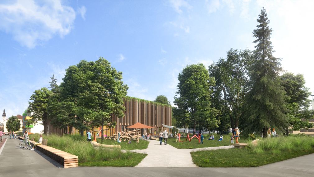 Eine Visualisierung zeigt, wie es im Altoona-Park einmal aussehen könnte:  Zu sehen ist ein Park, ein Spielplatz und ein Gebäude mit Flachdach und viel Grün (Rendering: Steve Stiglmayr).